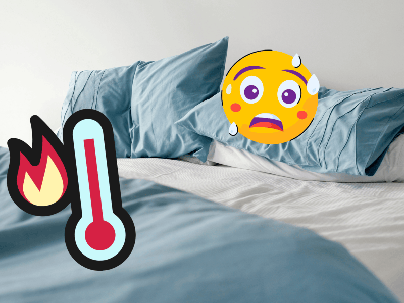 Ungemachtes Bett mit Hitze-Emoji und Thermometer-Zeichnung